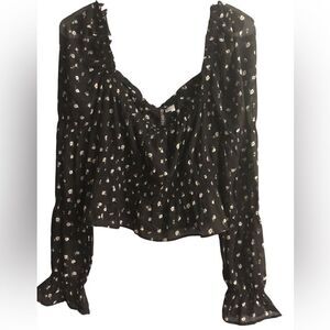 007. H&M divided peplum Black Floral Women's Top size medium NWT
